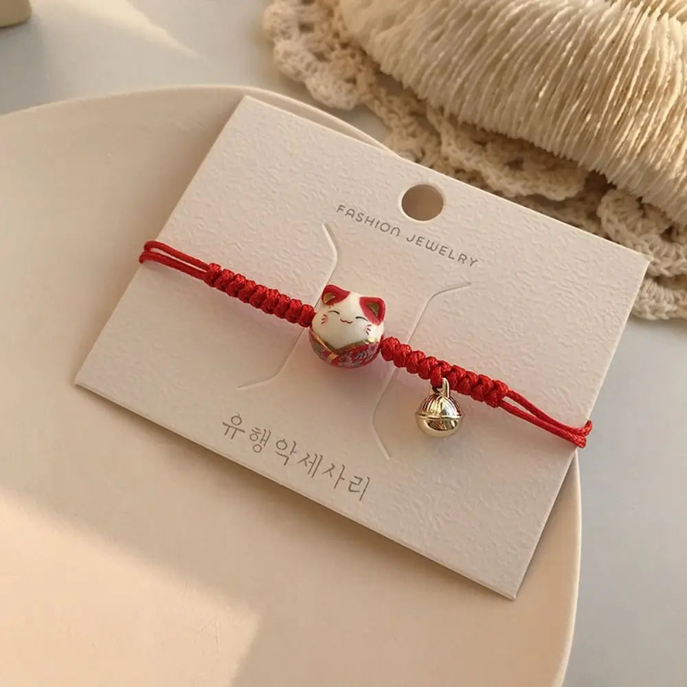 Bracelet Maneki Neko Chat Kawaii Fait Main Cordon Rouge - Câlin Kawaii