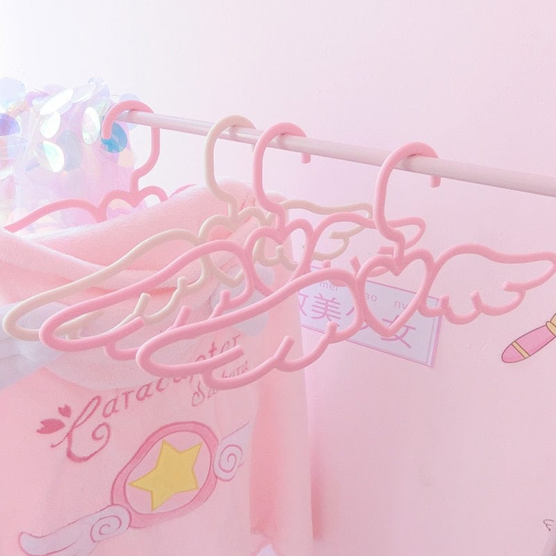 Cintre Cœur Ailé en Plastique Rose Pâle et Crème