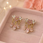 Boucles d'Oreilles Dorées à Fleurs Roses et Pendants Goutte
