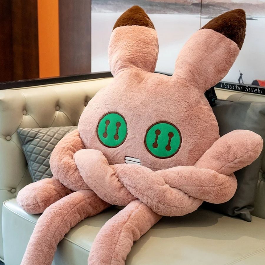 Peluche Créature Rose Poudré à Longues Pattes