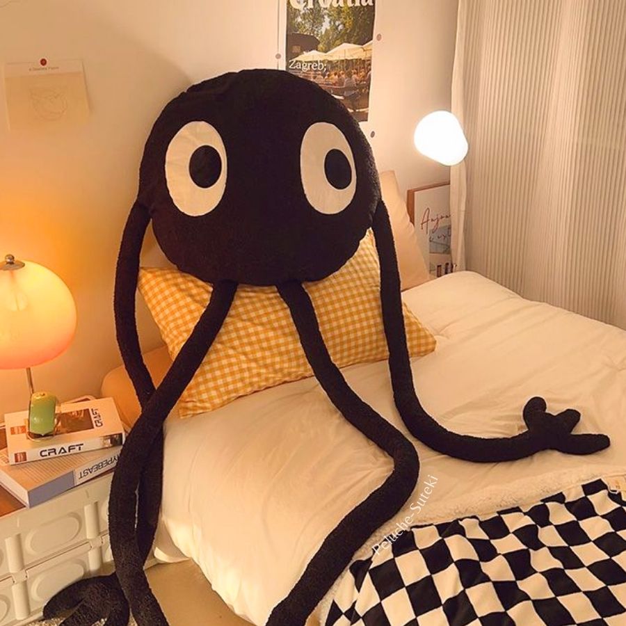 Peluche Blob Noir aux Grands Yeux et Longs Membres