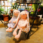 Doudou Lapin Rose Pâle à Robe Imprimée et Yeux Endormis