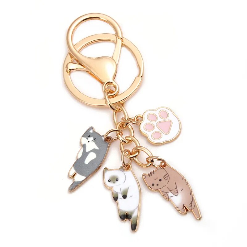 Porte-clés en Métal Doré Multi-Chats et Patte Rose