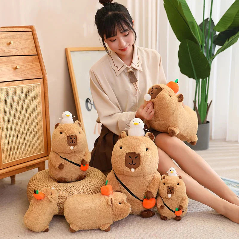 Peluche de Capybara Superposée avec Oiseau et Carotte