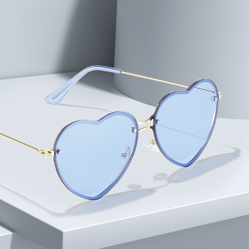 Lunettes de Soleil Cœur Bleu Clair à Monture Dorée