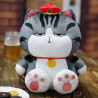 Peluche Chat Gris Tigré Grincheux au Chapeau Rouge