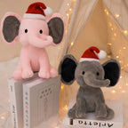 Éléphant en Peluche Rose avec Bonnet de Noël