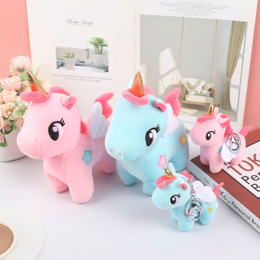 Peluche Licorne Rose à Corne Dorée et Étoile Bleue