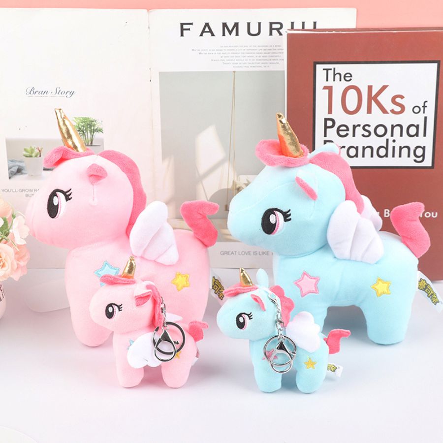 Peluche Licorne Rose à Corne Dorée et Étoile Bleue