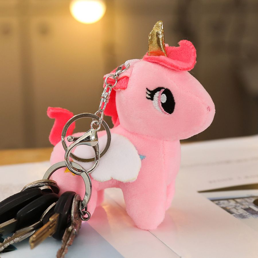Peluche Licorne Rose à Corne Dorée et Étoile Bleue