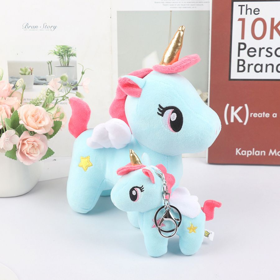 Peluche Licorne Rose à Corne Dorée et Étoile Bleue