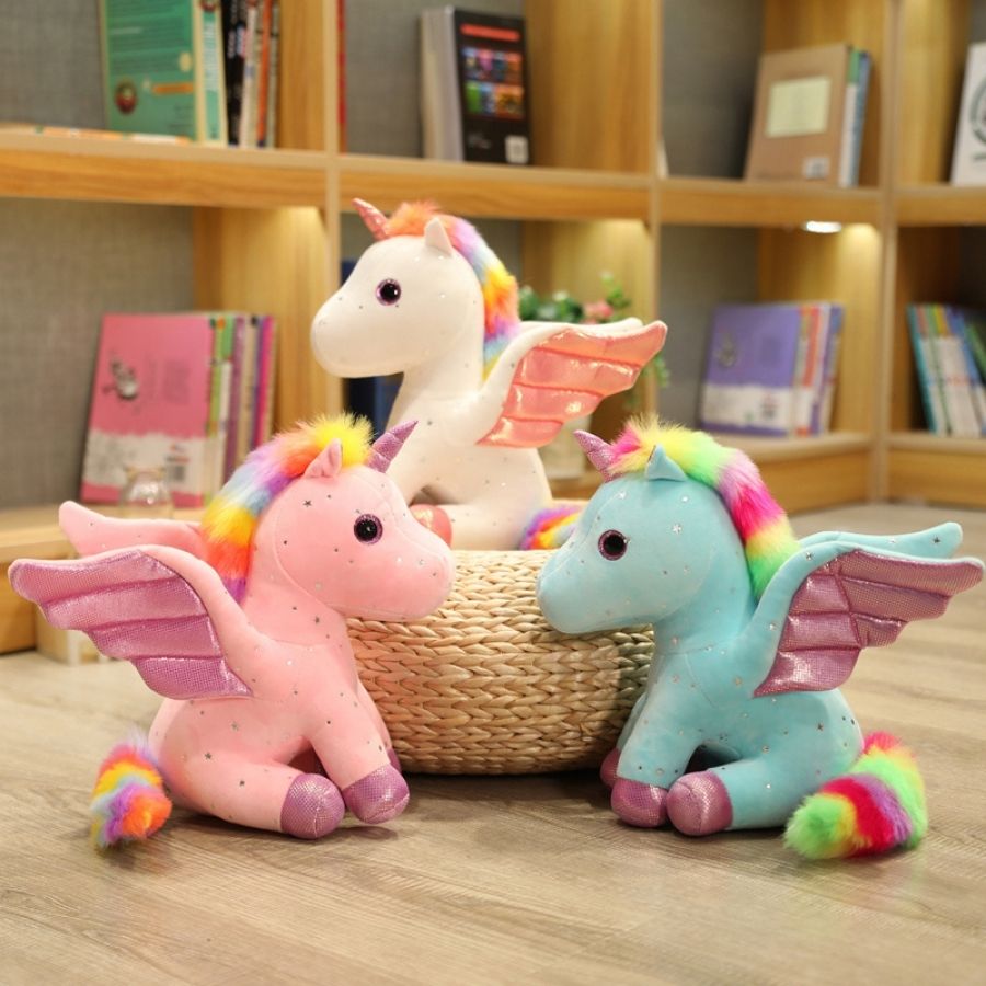 Peluche Licorne Rose Pâle aux Ailes Scintillantes