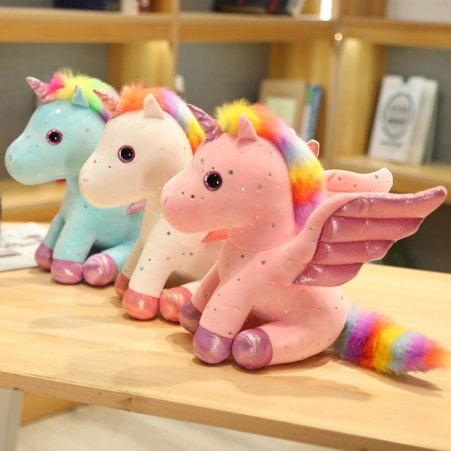 Peluche Licorne Rose Pâle aux Ailes Scintillantes