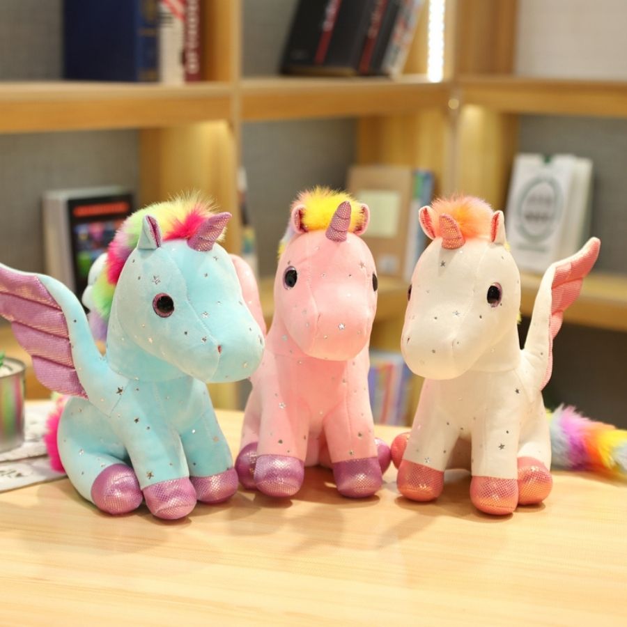 Peluche Licorne Rose Pâle aux Ailes Scintillantes
