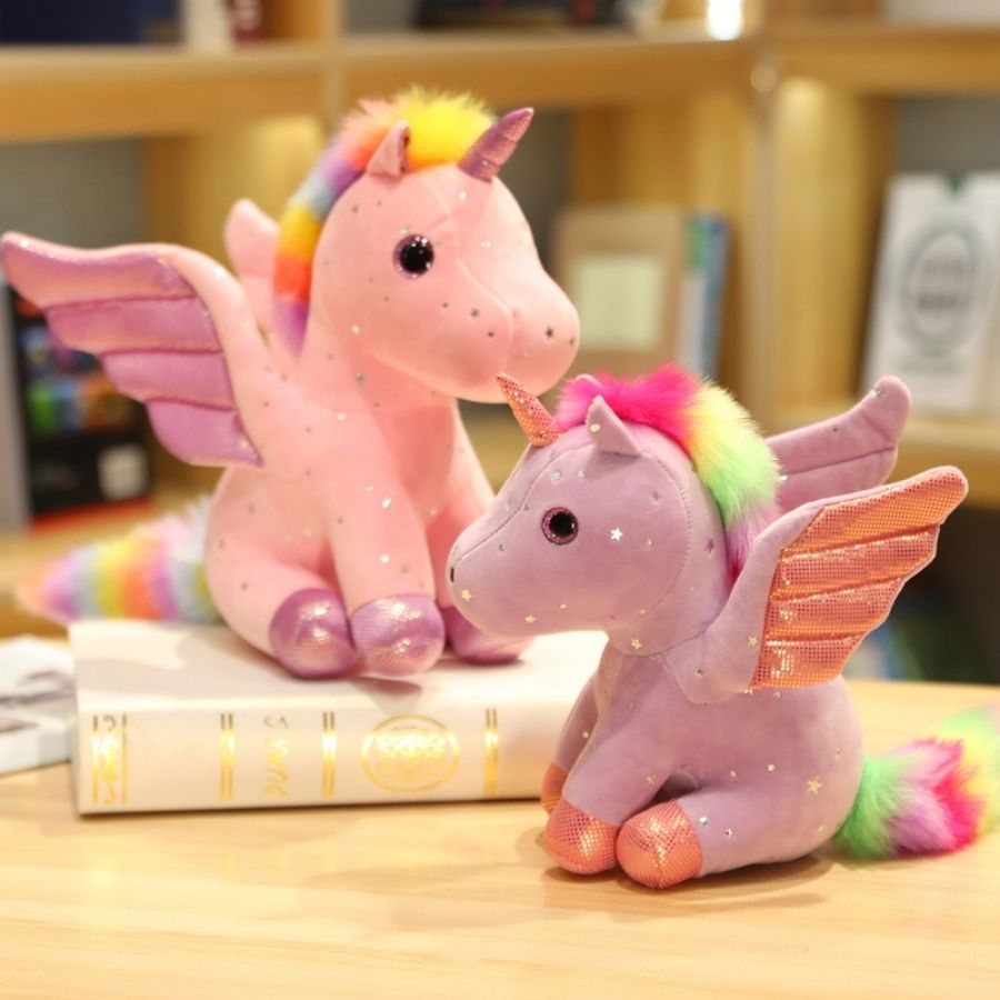 Peluche Licorne Rose Pâle aux Ailes Scintillantes