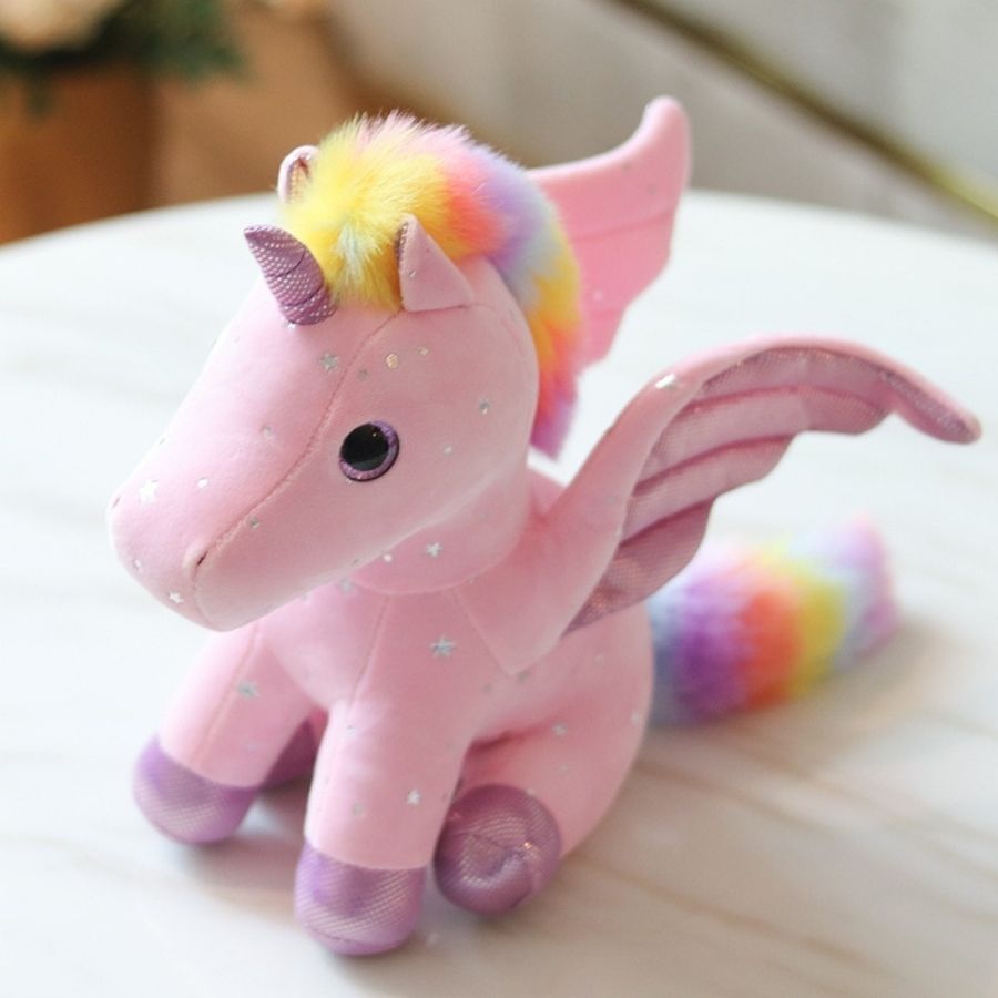 Peluche Licorne Rose Pâle aux Ailes Scintillantes