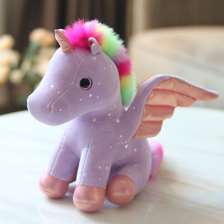 Peluche Licorne Rose Pâle aux Ailes Scintillantes