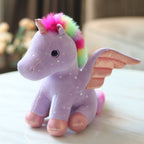 Peluche Licorne Rose Pâle aux Ailes Scintillantes