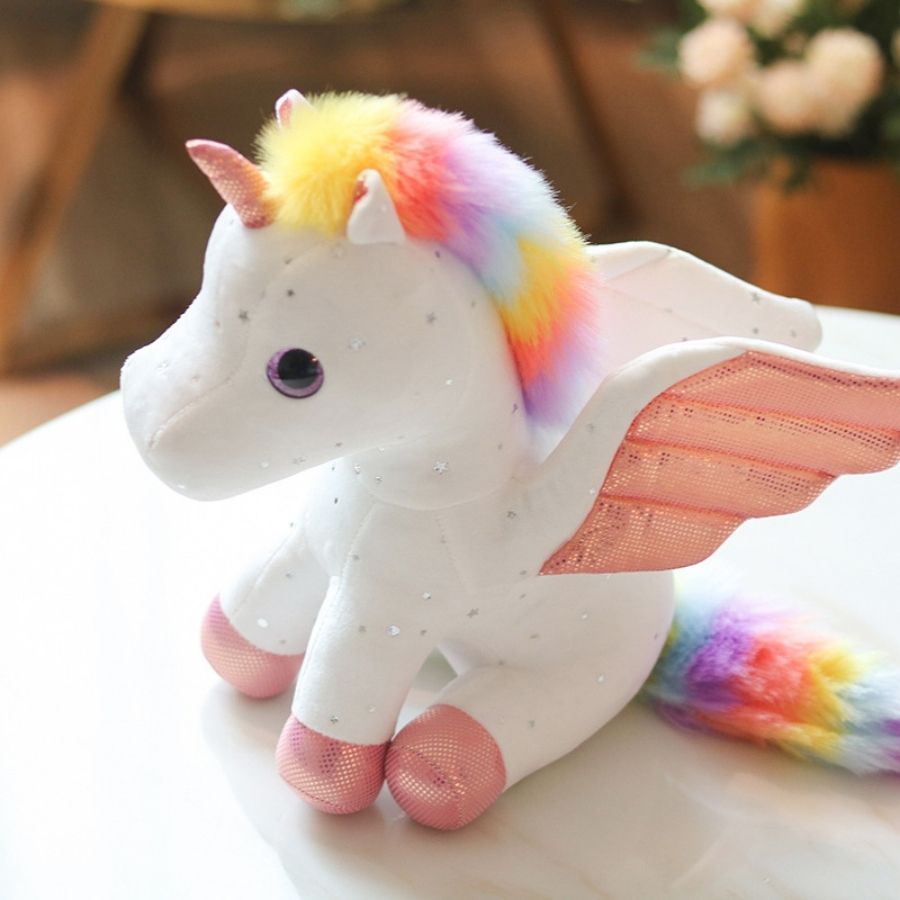 Peluche Licorne Rose Pâle aux Ailes Scintillantes