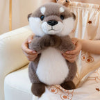 Peluche Loutre Grise et Blanche aux Bras Ouverts