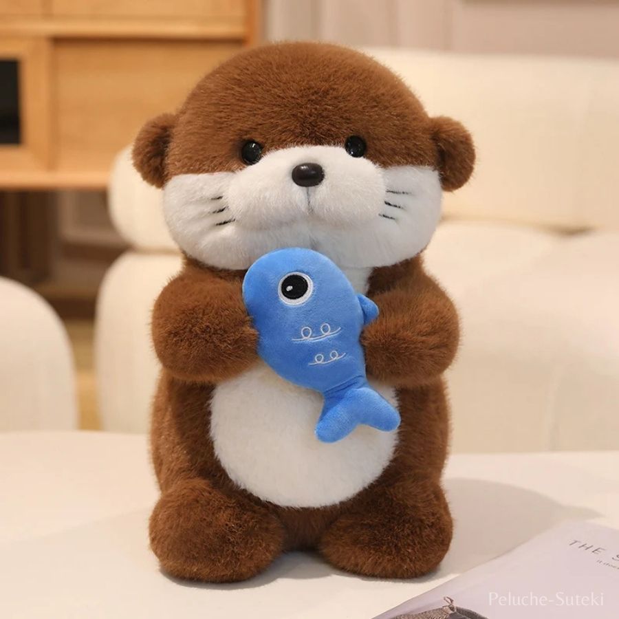 Peluche Loutre Marron avec Poisson Bleu