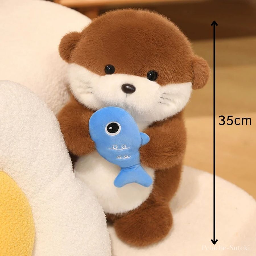 Peluche Loutre Marron avec Poisson Bleu