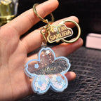 Porte-clés Fleur de Cerisier Rose à Paillettes Scintillantes