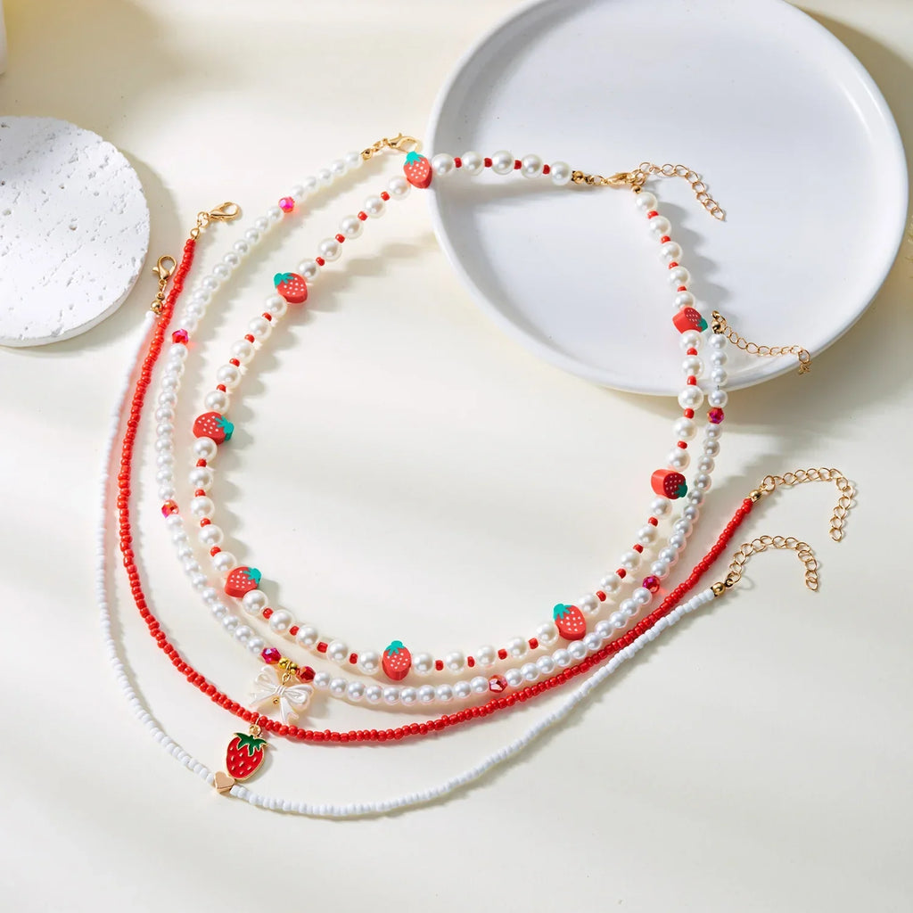 Collier Multirangs Perles et Fraises Rouge et Blanc