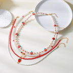 Collier Multirangs Perles et Fraises Rouge et Blanc