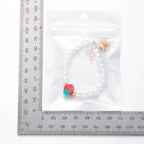 Collier Multirangs Perles et Fraises Rouge et Blanc