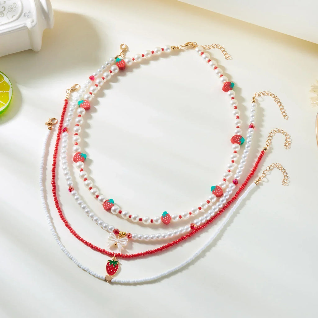 Collier Multirangs Perles et Fraises Rouge et Blanc